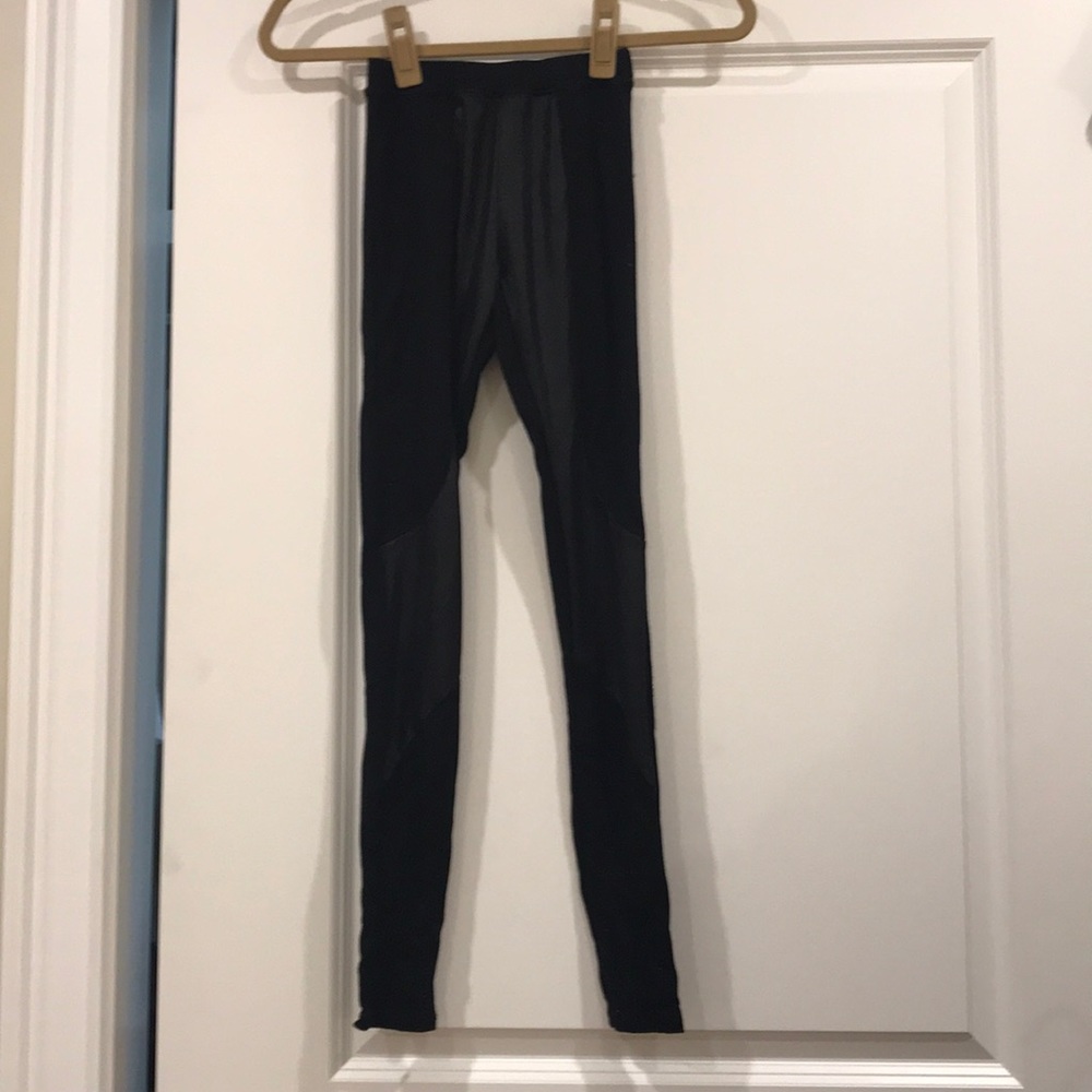 Black leggings with leather panels
